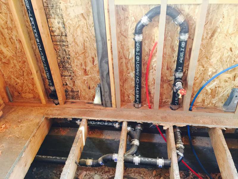 Under a home plumbing pipes